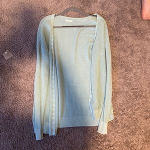 Mint green, crocheted sweater from Maurice’s, long, covers below waist